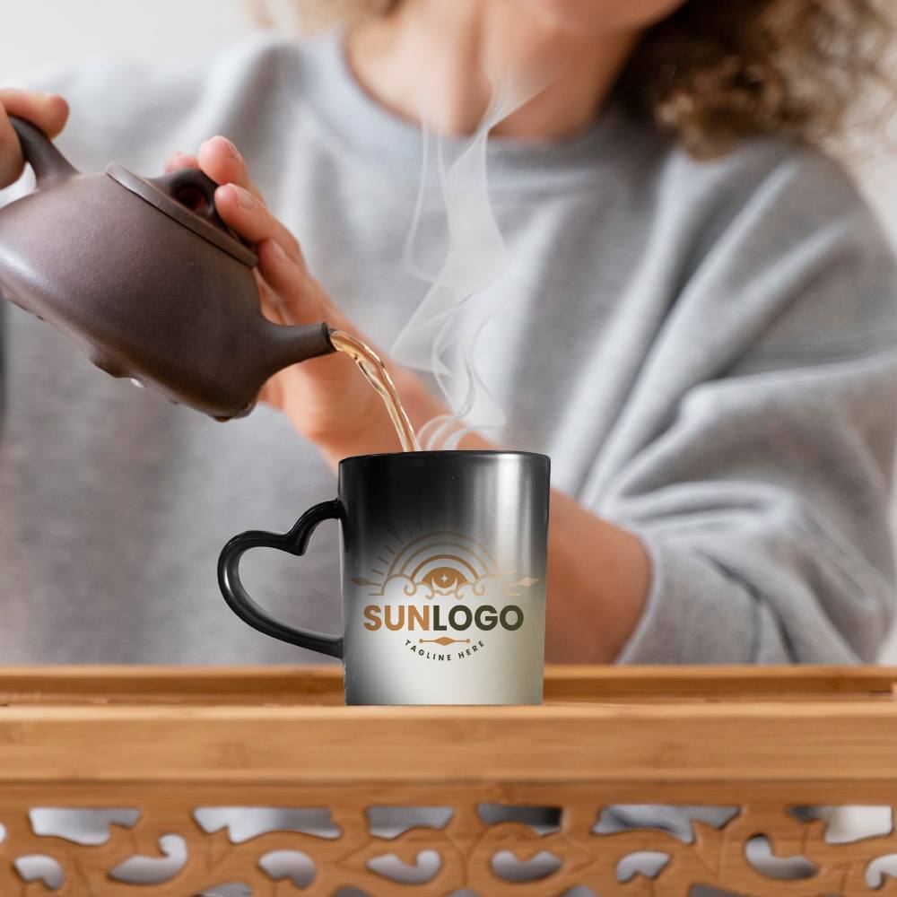 Taza mágica negra con asa de corazón SublimArts de 11oz